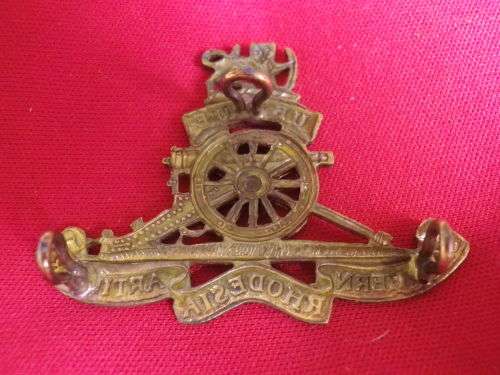 SOUTHERN RHODESIA ARTILLERY  - BRASS  HEADDRESS BADGE     (V168)