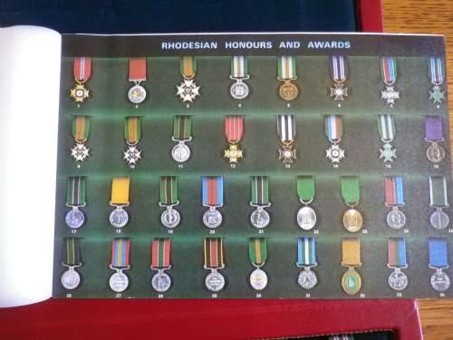 "RHODESIAN HONOURS & AWARDS" - REUTELER SET NO 456 -  34 MINIATURE MEDALS IN ORIGINAL CASE - (4766)