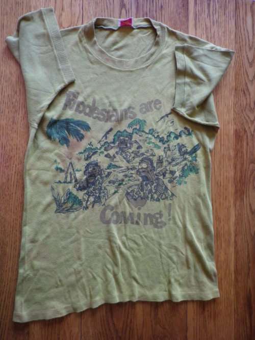 "THE RHODESIANS ARE COMING"  ICONIC TEE SHIRT FROM THE BUSH WAR - MADE BY MONOGRAM - SIZE 102 CM