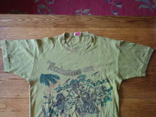 "THE RHODESIANS ARE COMING"  ICONIC TEE SHIRT FROM THE BUSH WAR - MADE BY MONOGRAM - SIZE 102 CM