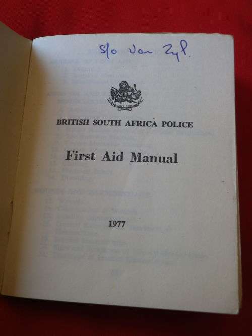 RHODESIA - BSAP FIRST AID MANUAL 1977 - 140 PAGES. INSCRIBED - (2605)