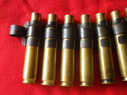 SA BORDER WAR - 20 ROUND 12.7mm CASES IN LINK BELT - SEE PICS FOR MARKINGS   (4104)