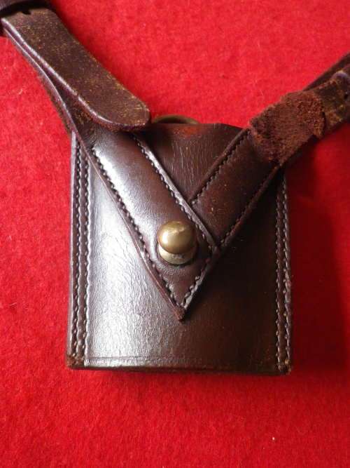 RHODESIA COLONIAL - BROWN LEATHER SWORD FROG.      (4220)