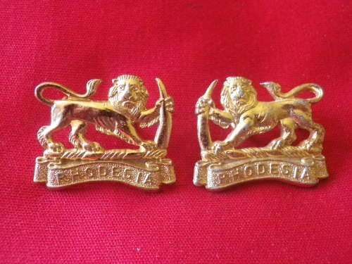 RHODESIAN STAFF CORPS - FACING PAIR GOLD ANODISED COLLAR BADGES      (6973)