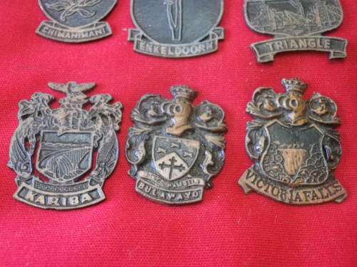 RHODESIAN LOT  - 16 X CITY / TOWN / PLACE CRESTS - OFF A DISPLAY - HAS MOUNTING RESIDUE ON REVERSE