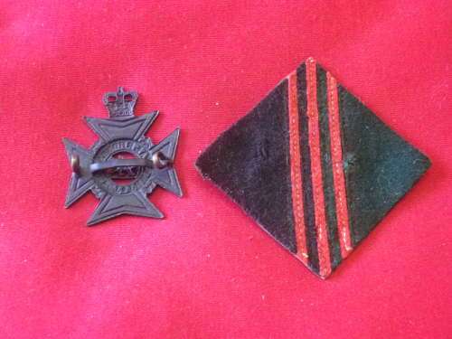 ROYAL RHODESIA  REGT.  QC BLACKENED BRASS CAP BADGE ON SCARCE 3Bn. (NR)   BACKING       (2381)
