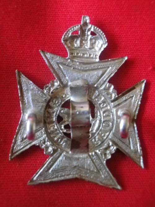 RHODESIA REGT. CHROMED CAP BADGE 1927-1947    (7453)