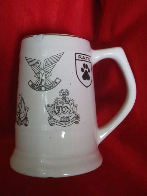 RHODESIAN ARMED FORCES (MAJOR UNITS) MUG - HAS REPAIR + CHIPS      (1057)