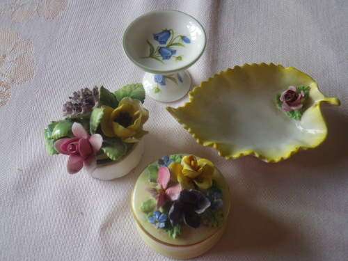 4 SMALLPRETTY  PORCELAIN ITEMS - NOTE 1 CHIP ON FLOWER OF LID OF THE BOX...OTHERS IN GOOD CONDITION