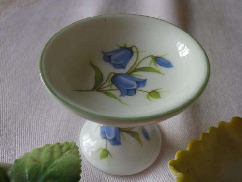 4 SMALLPRETTY  PORCELAIN ITEMS - NOTE 1 CHIP ON FLOWER OF LID OF THE BOX...OTHERS IN GOOD CONDITION
