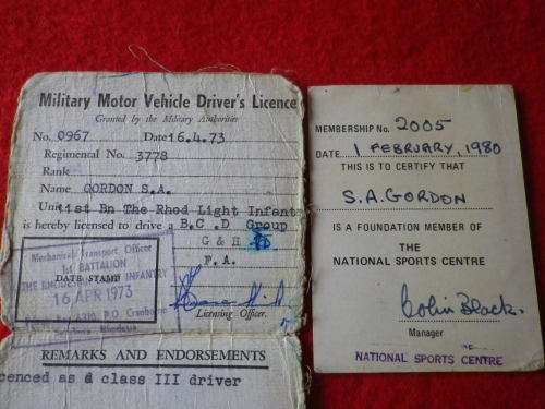 RHODESIAN - 2 X MILITARY DRIVERS LICENCES, SOME WEAR - OWNERS DETAILS AS SEEN    (8074)