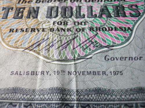 RHODESIAN $10 NOTE - CONDITION AS SEEN - 19 NOVEMBER 1975         (8185)