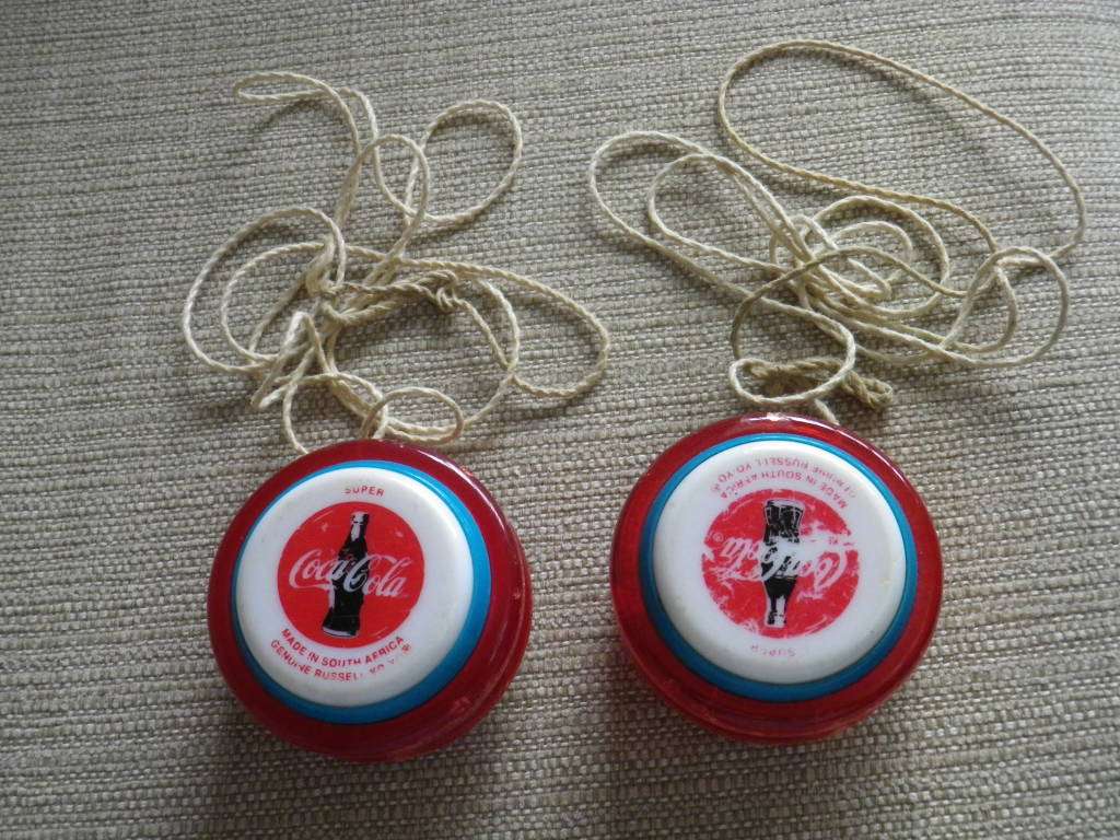 2 X RUSSEL SUPER COCA COLA YOYO`S + STRINGS - NOTE CHIPS - SEE PICS     (2951)