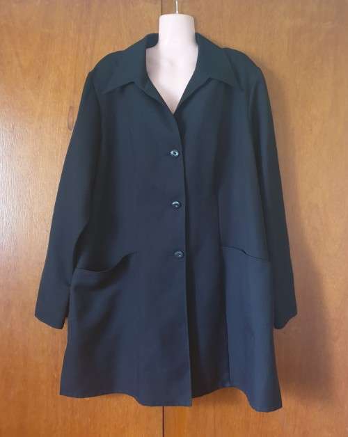 Black formal / work jacket with pockets No label or size but would guess it would fit a L or XL