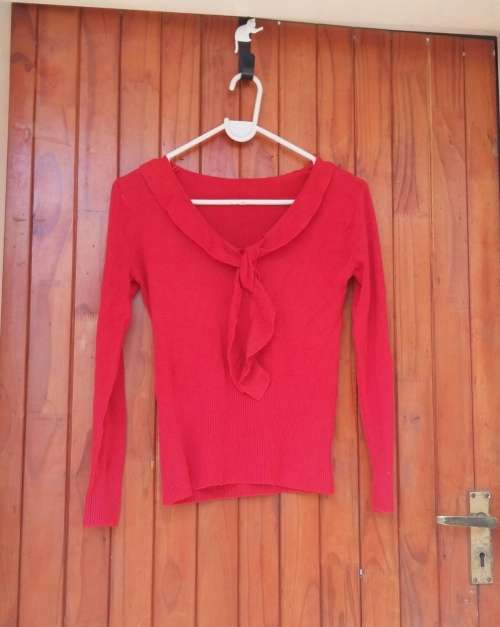 Cute red jersey  No size but would fit a small to medium