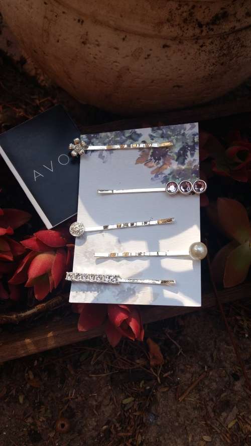 Really pretty hair pins by Avon Condition: new