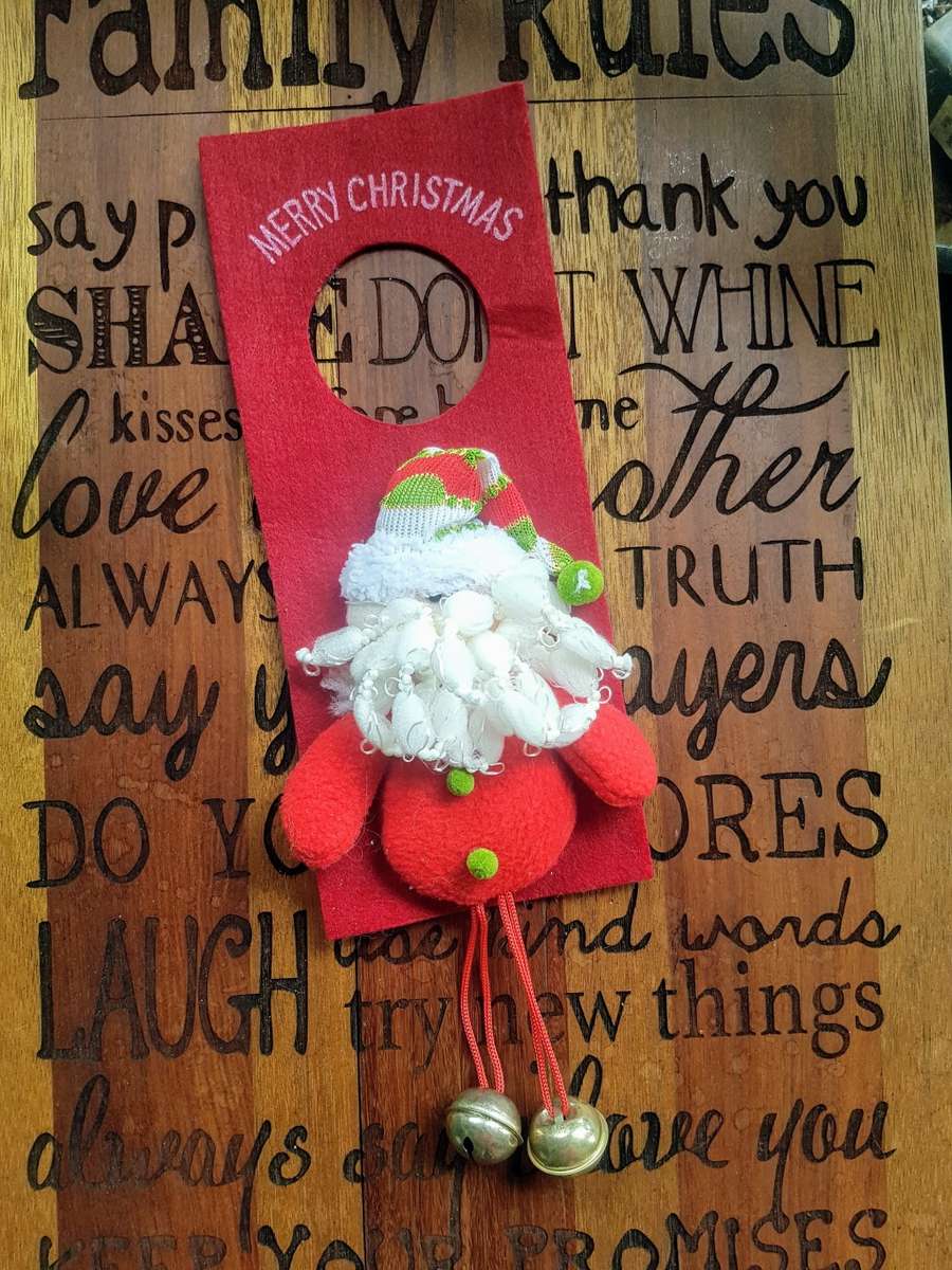Cute Father Christmas deco with bells to hang on your door handle