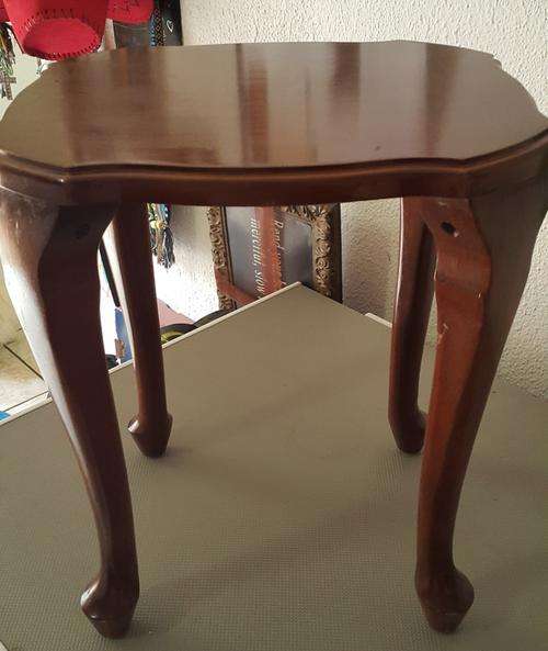 A set of three beautiful small coffee tables