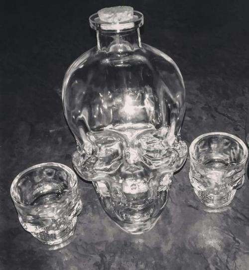 Skull Potion Bottle And Three Skull Shooter Glasses Set