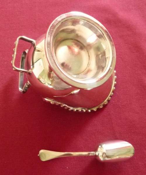Silver plated sugar scuttle and scoop
