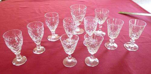 A collection of cut crystal port or dessert wine glasses