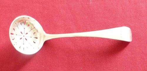 Victorian silver straining ladle