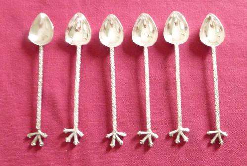 Six unusual silver plated coffee spoons