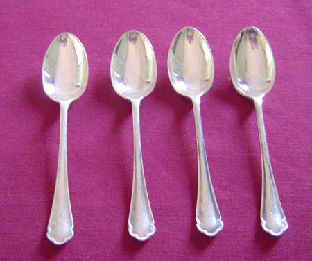 Four silver teaspoons