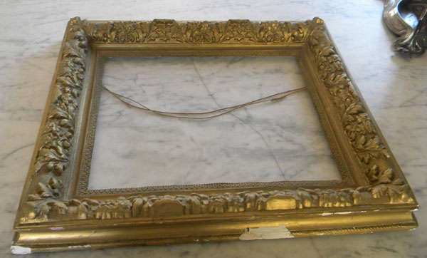 Heavy gilt frame
