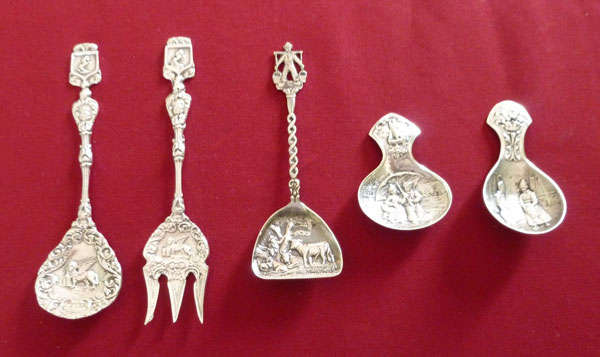 Collection of five ornate Dutch serving pieces