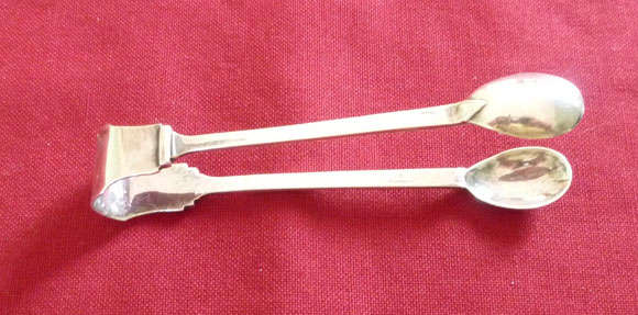Pair of art deco silver tongs