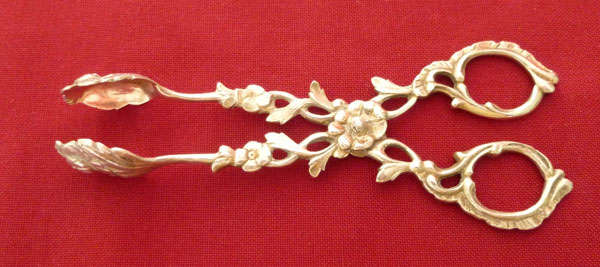 Decorative art nouveau silver sugar tongs