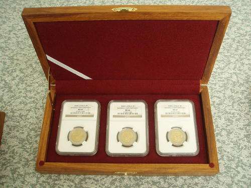Mandela 90th Birthday 3 piece set, all graded by NGC, MS65,MS66,MS67 in wooden display case