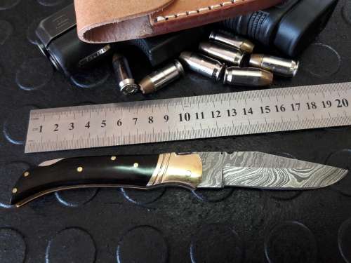 Handmade DAMASCUS  Folding Knife. BULL horn handle scales. Crazy R1 start, No reserve.