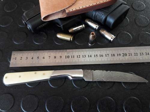 Handmade DAMASCUS  Folding Knife. Please study pictures for detail. Crazy R1 start, No reserve.