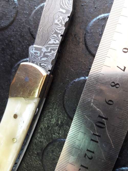 Handmade DAMASCUS  Folding Knife. Please study pictures for detail. Crazy R1 start, No reserve.
