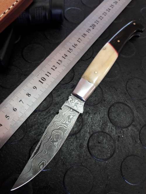Handmade DAMASCUS  Folding Knife. Please study pictures for detail. Crazy R1 start, No reserve.