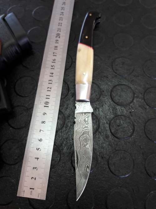 Handmade DAMASCUS  Folding Knife. Please study pictures for detail. Crazy R1 start, No reserve.