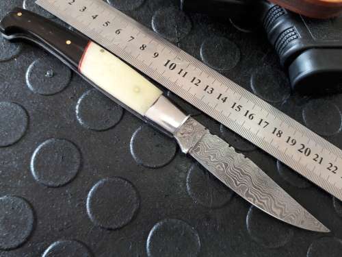 Handmade DAMASCUS  Folding Knife. Please study pictures for detail. Crazy R1 start, No reserve.