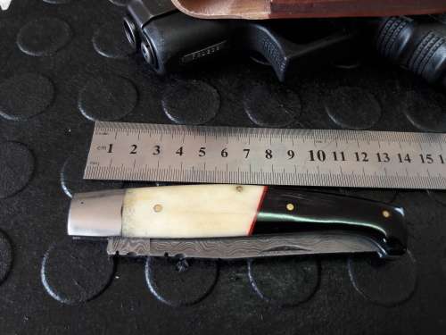 Handmade DAMASCUS  Folding Knife. Please study pictures for detail. Crazy R1 start, No reserve.