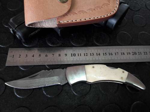 Handmade DAMASCUS  Folding Knife. Please study pictures for detail. Crazy R1 start, No reserve.