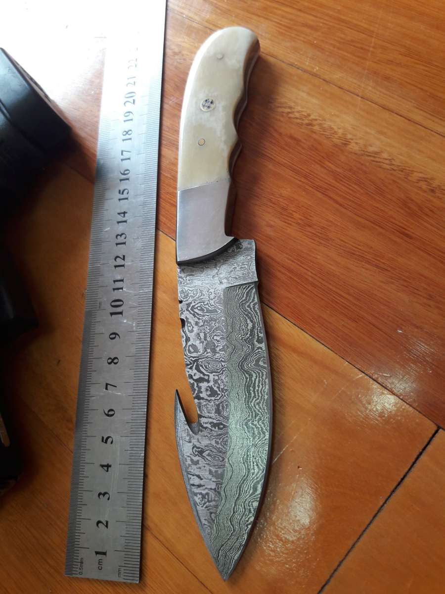 Handmade DAMASCUS Steel Knife, Camel Bone handle scales and gut hook.  Crazy R1 start, No reserve.