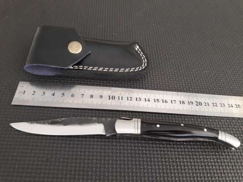 HANDMADE Black Ops, 1095 HIGH Carbon High quality steel folding knife with Bull Horn handle scales.