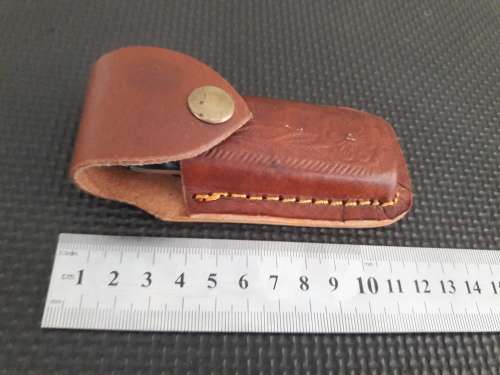 Handmade Damascus steel folding knife with Wooden handle scales.