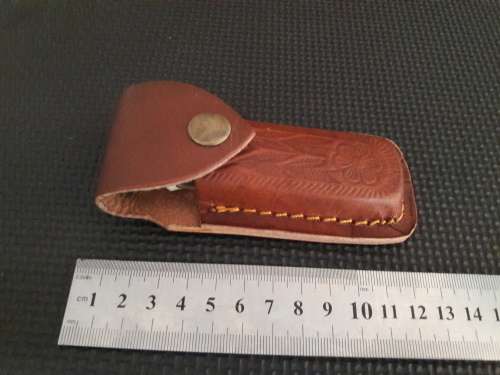 Handmade Damascus steel folding knife with WOOD & CAMEL BONE handle scales.