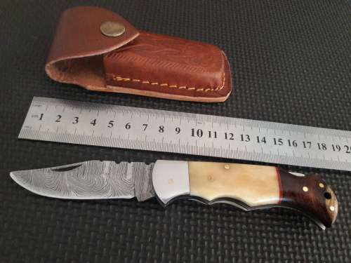 Handmade Damascus steel folding knife with WOOD & CAMEL BONE handle scales.
