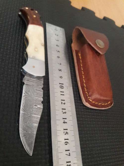 Handmade Damascus steel folding knife with WOOD & CAMEL BONE handle scales.