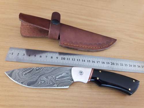 Handmade DAMASCUS Steel Hunting Knife, FULL TANG, Bull horn and Camel Bone handle scales.