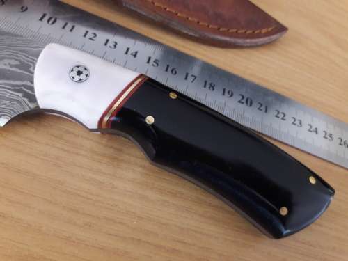 Handmade DAMASCUS Steel Hunting Knife, FULL TANG, Bull horn and Camel Bone handle scales.