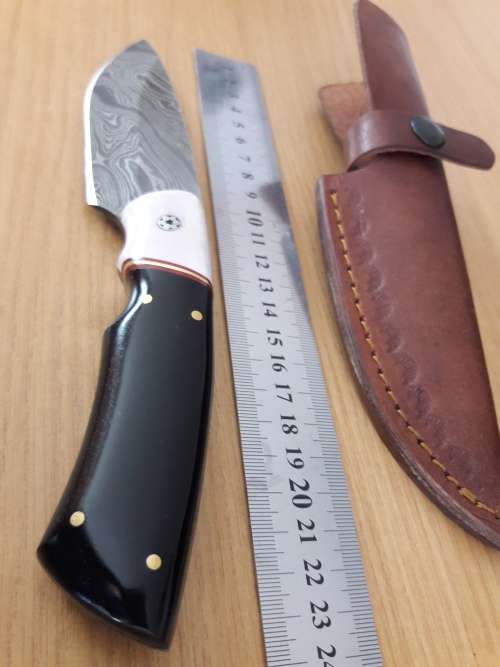 Handmade DAMASCUS Steel Hunting Knife, FULL TANG, Bull horn and Camel Bone handle scales.